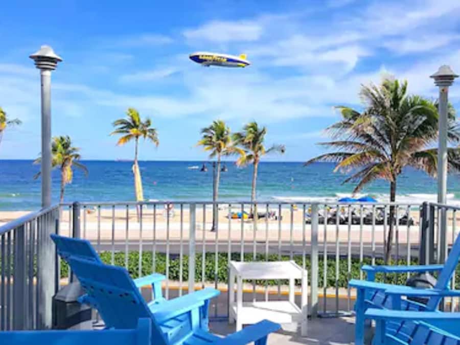 Beach nearby, white sand, beach umbrellas, beach towels
