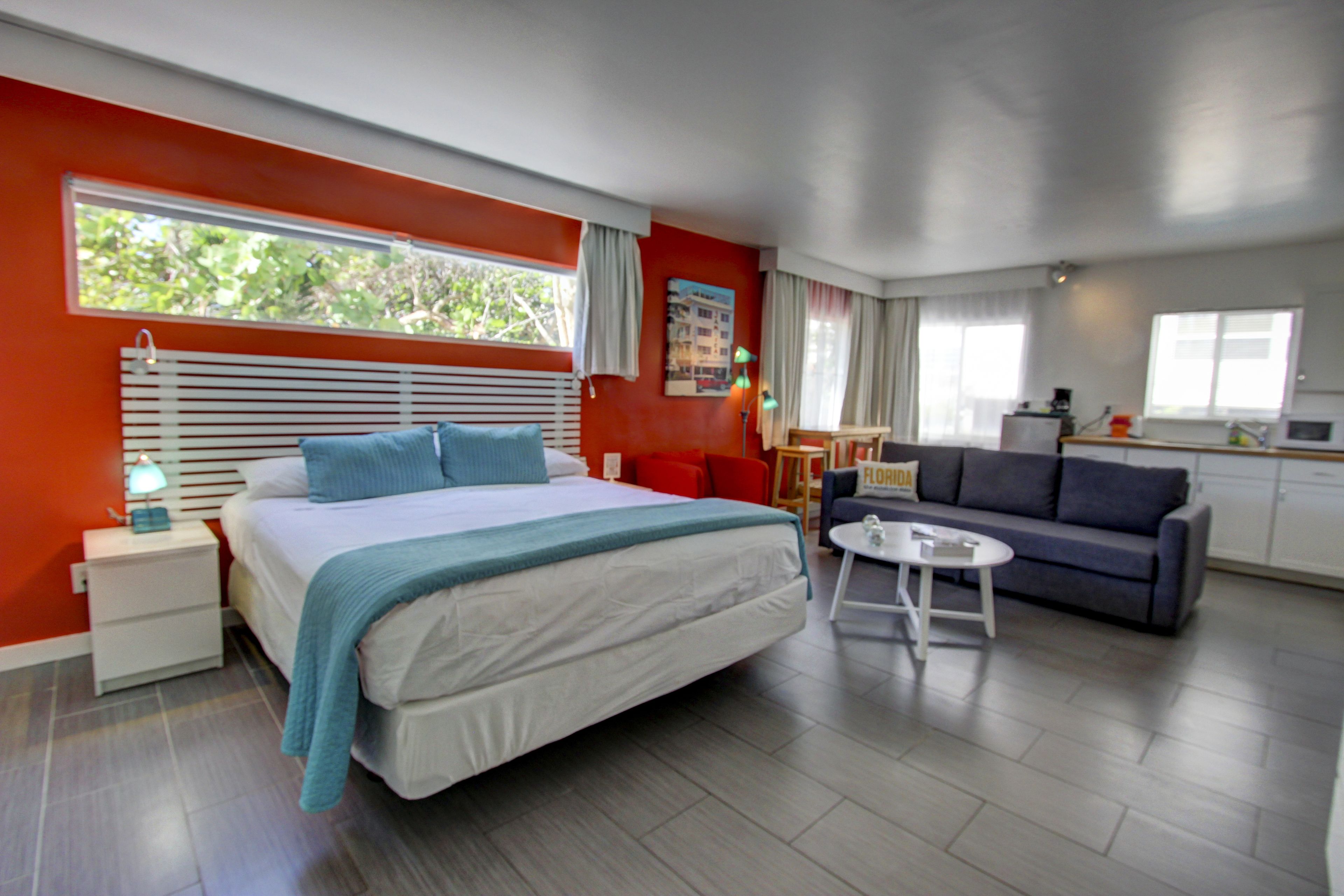 executive room, 1 king bed with sofa bed, kitchenette (minimum check-in age is 25) | living area | lcd tv