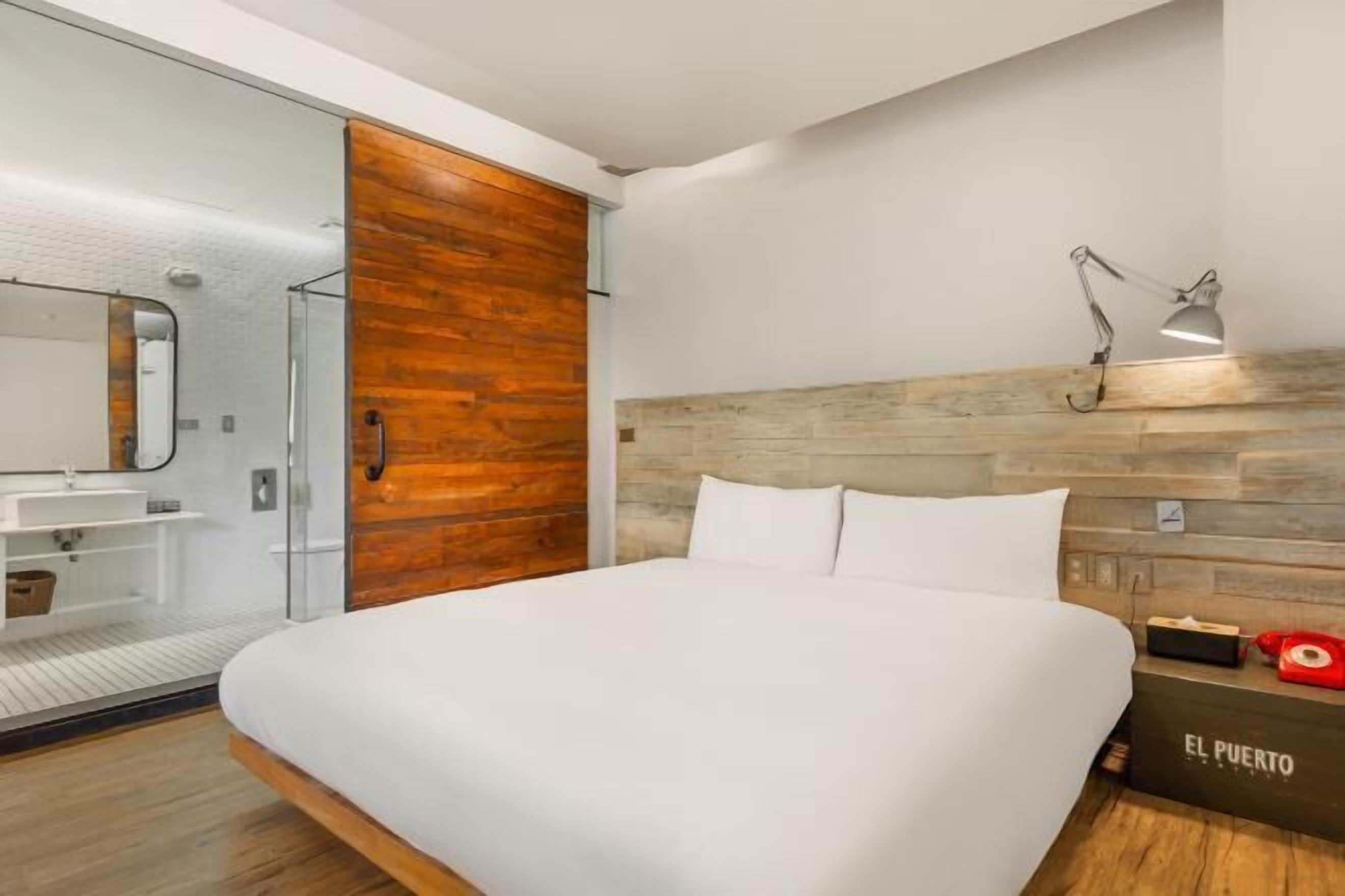 Down comforters, desk, blackout drapes, soundproofing