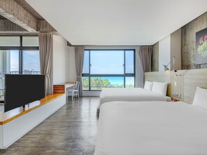 Quadruple Room, Multiple Beds | Down duvets, desk, blackout curtains, soundproofing - El Puerto Hotel (Hengchun)