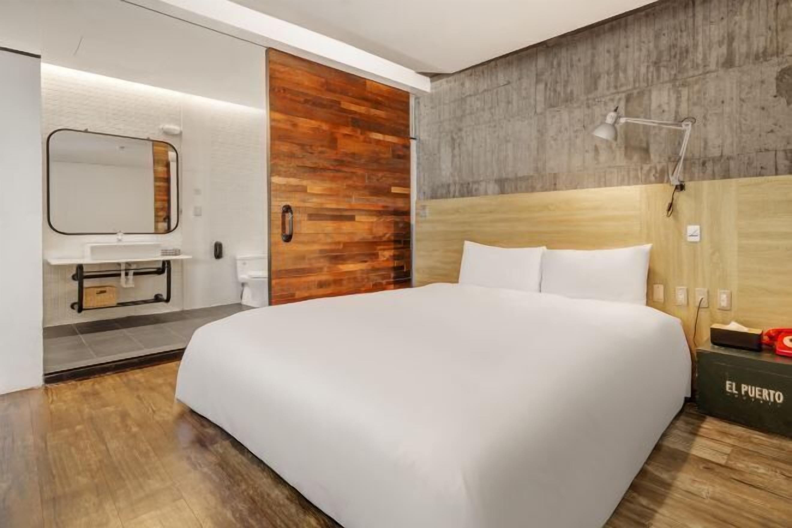 Down comforters, desk, blackout drapes, soundproofing