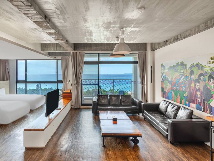 Deluxe Quad Sea View | Down duvets, desk, blackout curtains, soundproofing