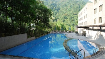 Seasonal outdoor pool, pool umbrellas, pool loungers