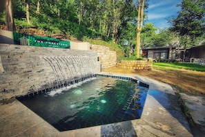 Outdoor pool, open 8:00 AM to 8:00 PM, pool umbrellas