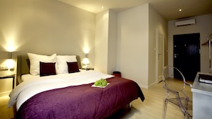 Habitación básica doble | Tabla de planchar con plancha, cunas (de pago), camas supletorias y wifi