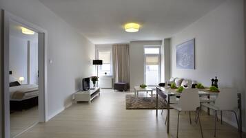 Apartment Master, 1 Bedroom | Living room | LCD TV