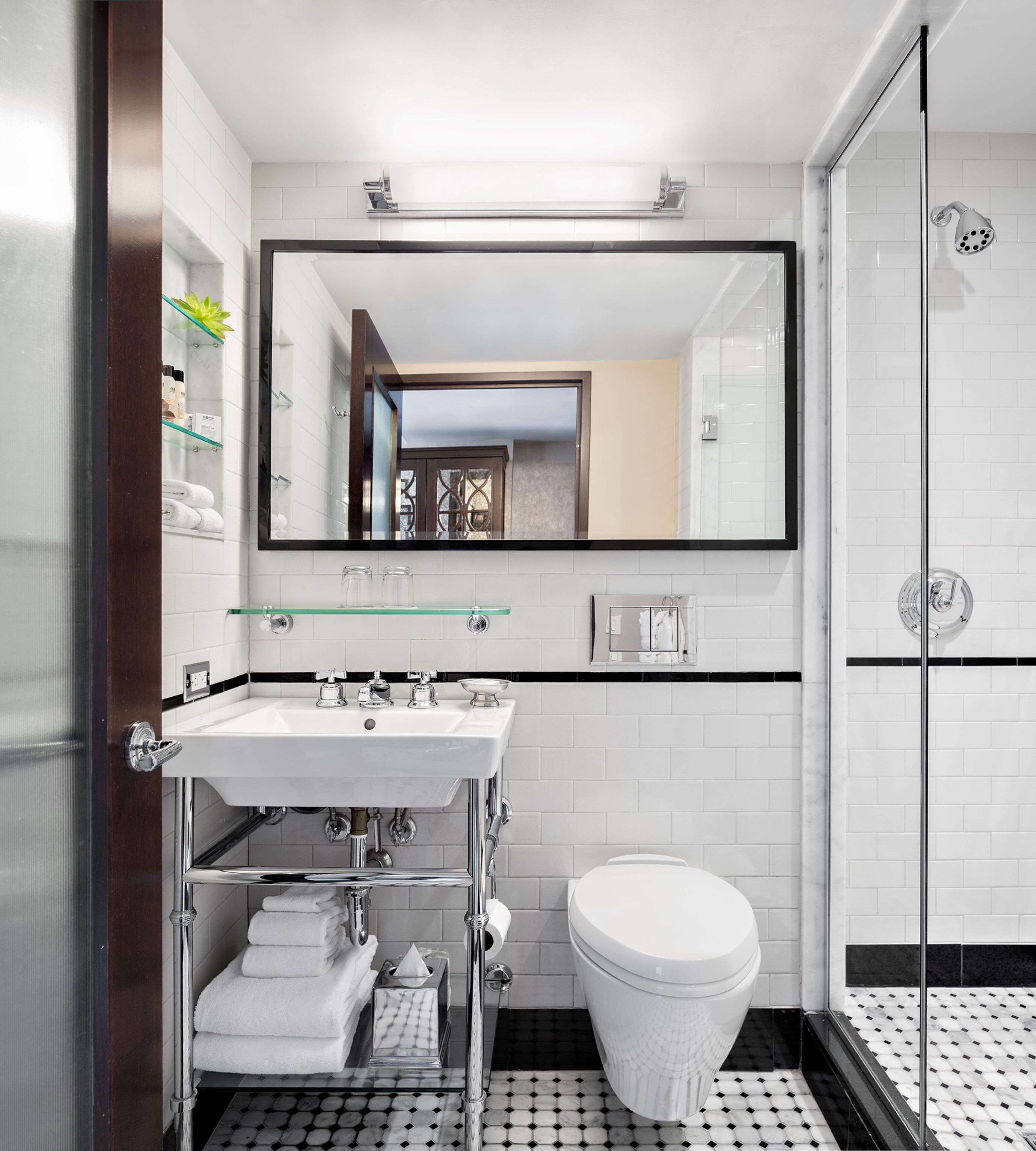 shower, designer toiletries, hair dryer, slippers