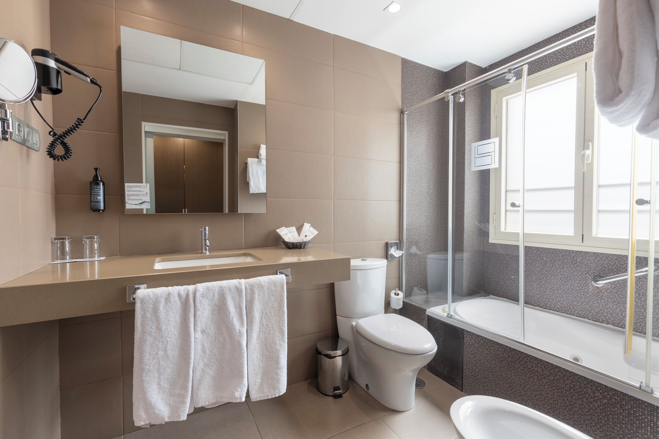 premium bedding, tempur-pedic beds, in-room safe, desk