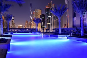 Outdoor pool, open 7:00 AM to 9:00 PM, pool umbrellas, sun loungers