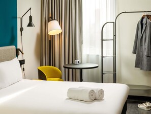 Hypo-allergenic bedding, desk, blackout drapes, soundproofing