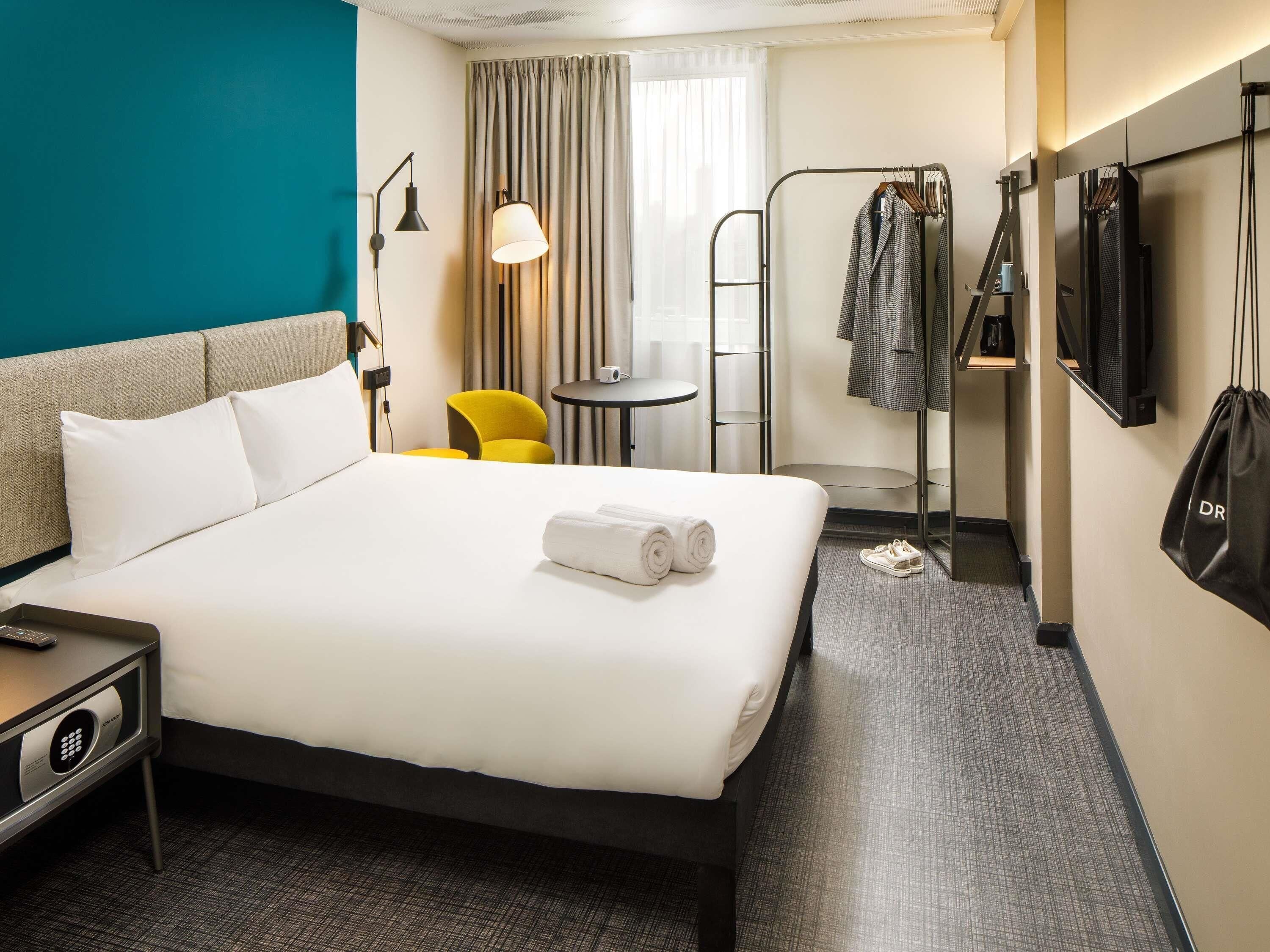 Hypo-allergenic bedding, desk, blackout drapes, soundproofing