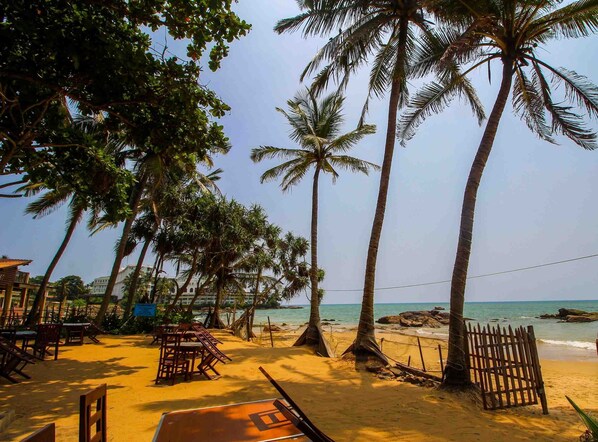 Am Strand, Liegestühle, Angeln