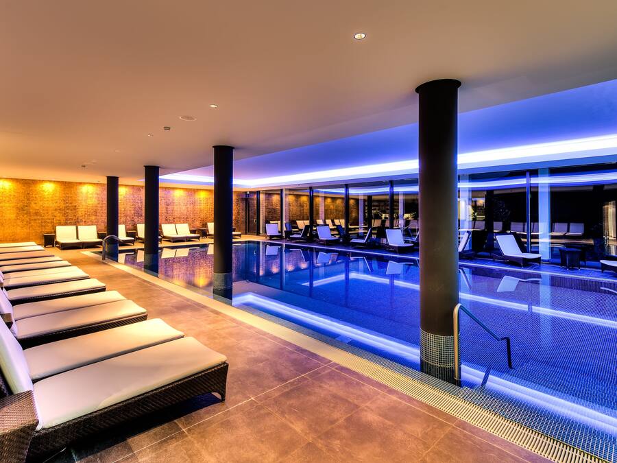 Indoor pool, open 7:00 AM to 10:00 PM, sun loungers