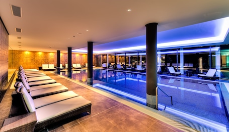 Indoor pool, open 7:00 AM to 10:00 PM, sun loungers