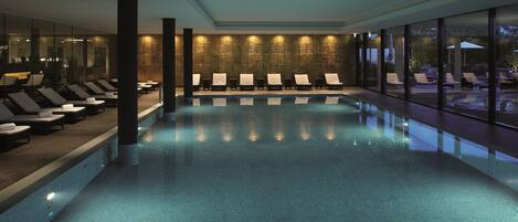 Indoor pool, open 7:00 AM to 10:00 PM, pool loungers