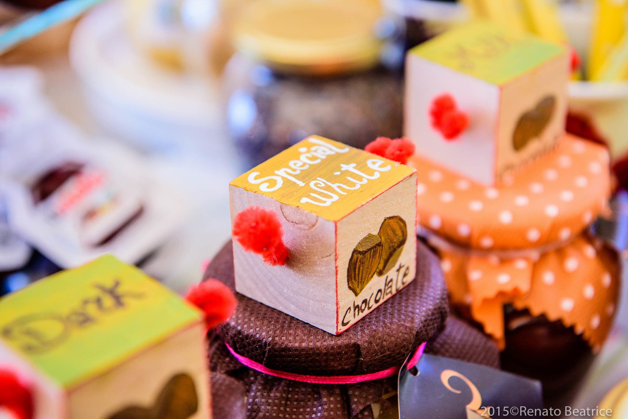 A variety of chocolate boxes with different designs and labels, including 'Special White' and 'Dark' chocolate.