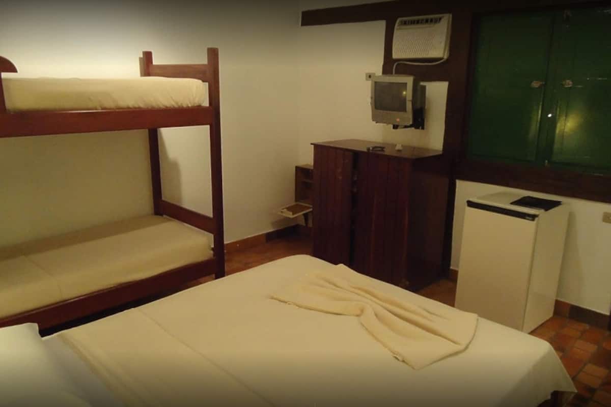 Standard Quadruple Room | Minibar, in-room safe, iron/ironing board, free WiFi