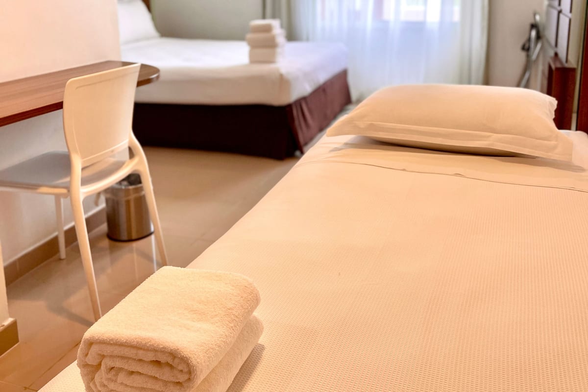 standard triple room | minibar, in-room safe, desk, blackout curtains