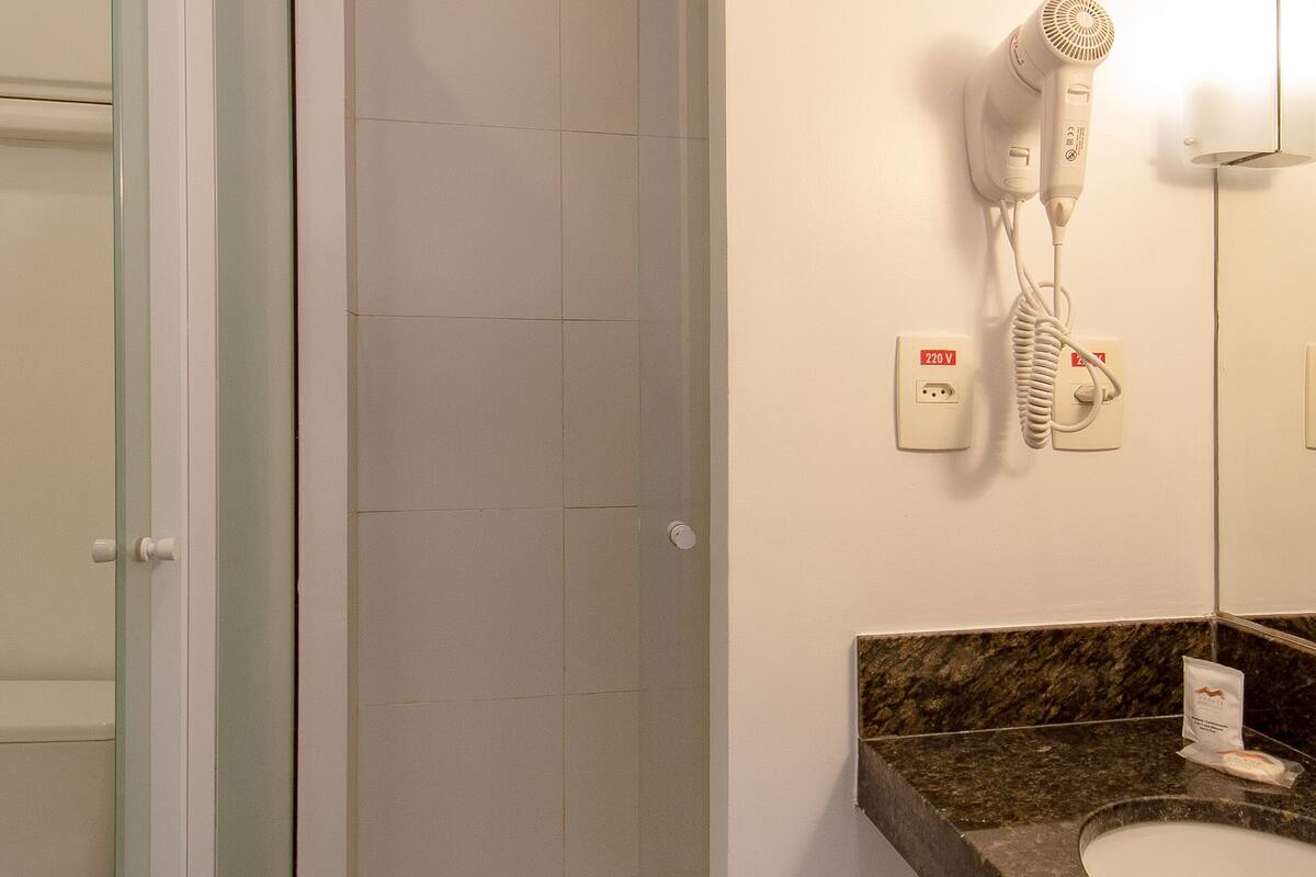 shower, free toiletries, hair dryer, towels