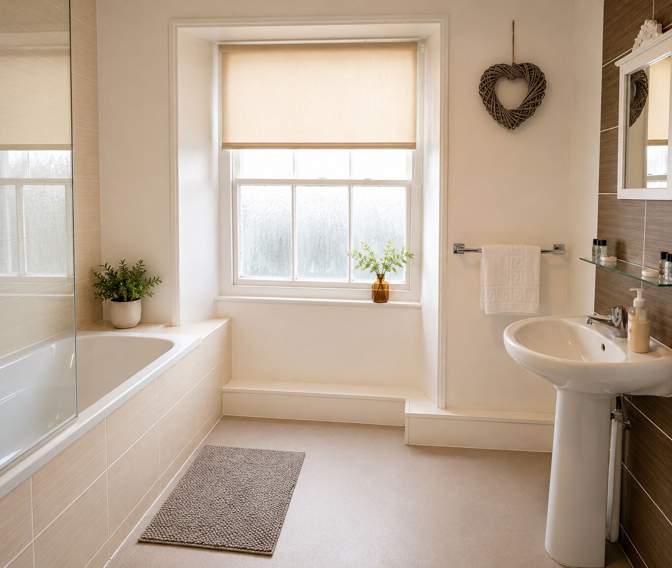 A bathroom with a bathtub, a sink, a window with a view, a towel rack, and a small plant.
