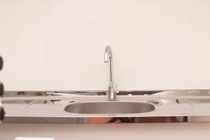 Oven, cookware/dishes/utensils