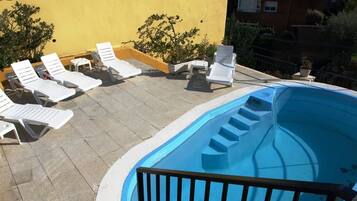 Seasonal outdoor pool, sun loungers