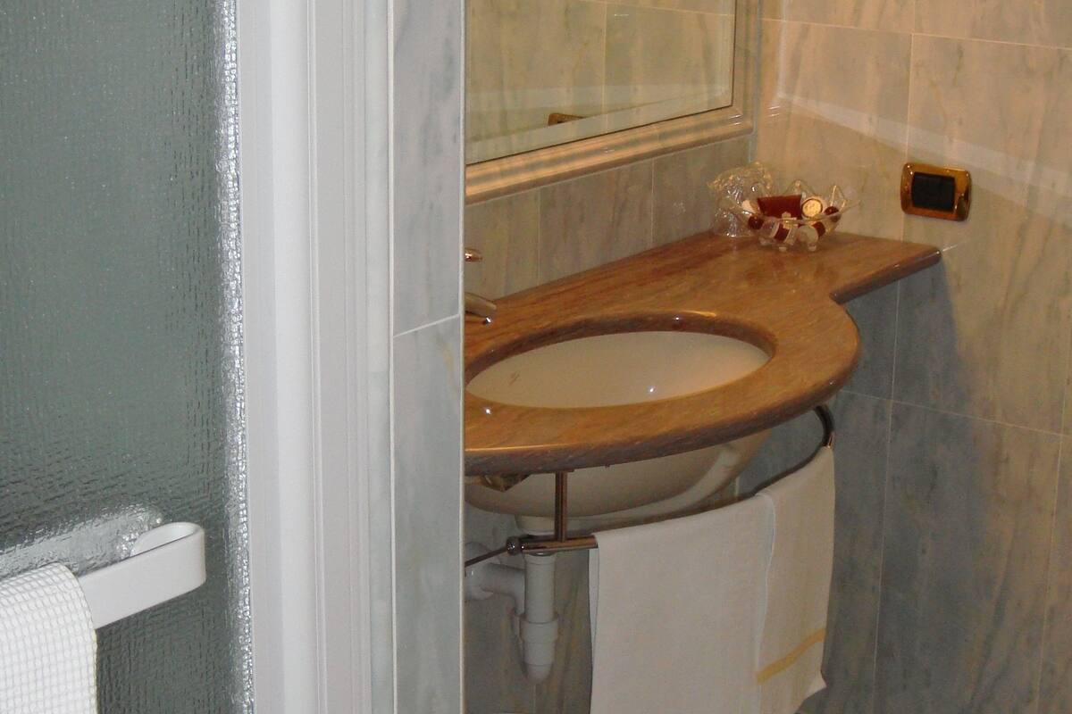 rainfall showerhead, designer toiletries, hair dryer, bathrobes