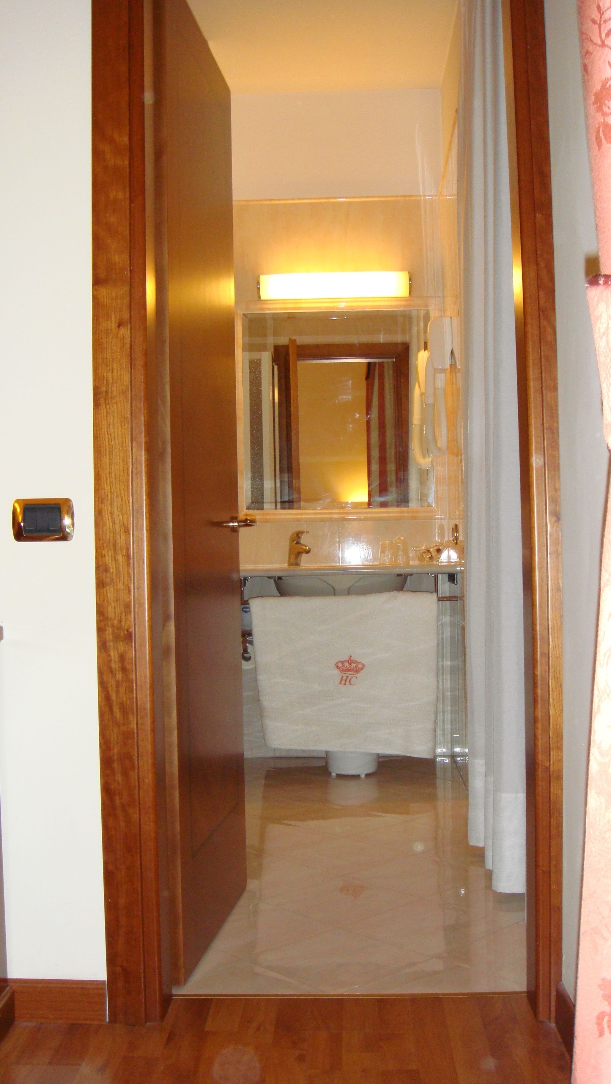 rainfall showerhead, designer toiletries, hair dryer, bathrobes