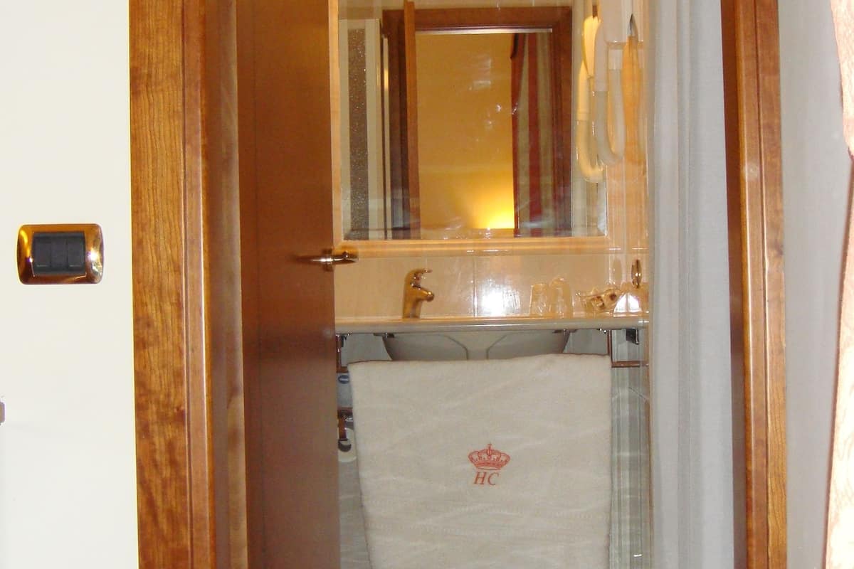 rainfall showerhead, designer toiletries, hair dryer, bathrobes