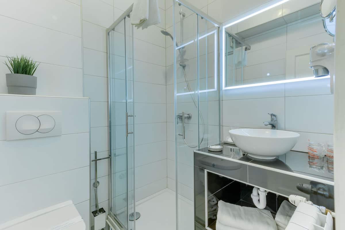 family room, terrace | bathroom | shower, rainfall showerhead, hair dryer, slippers