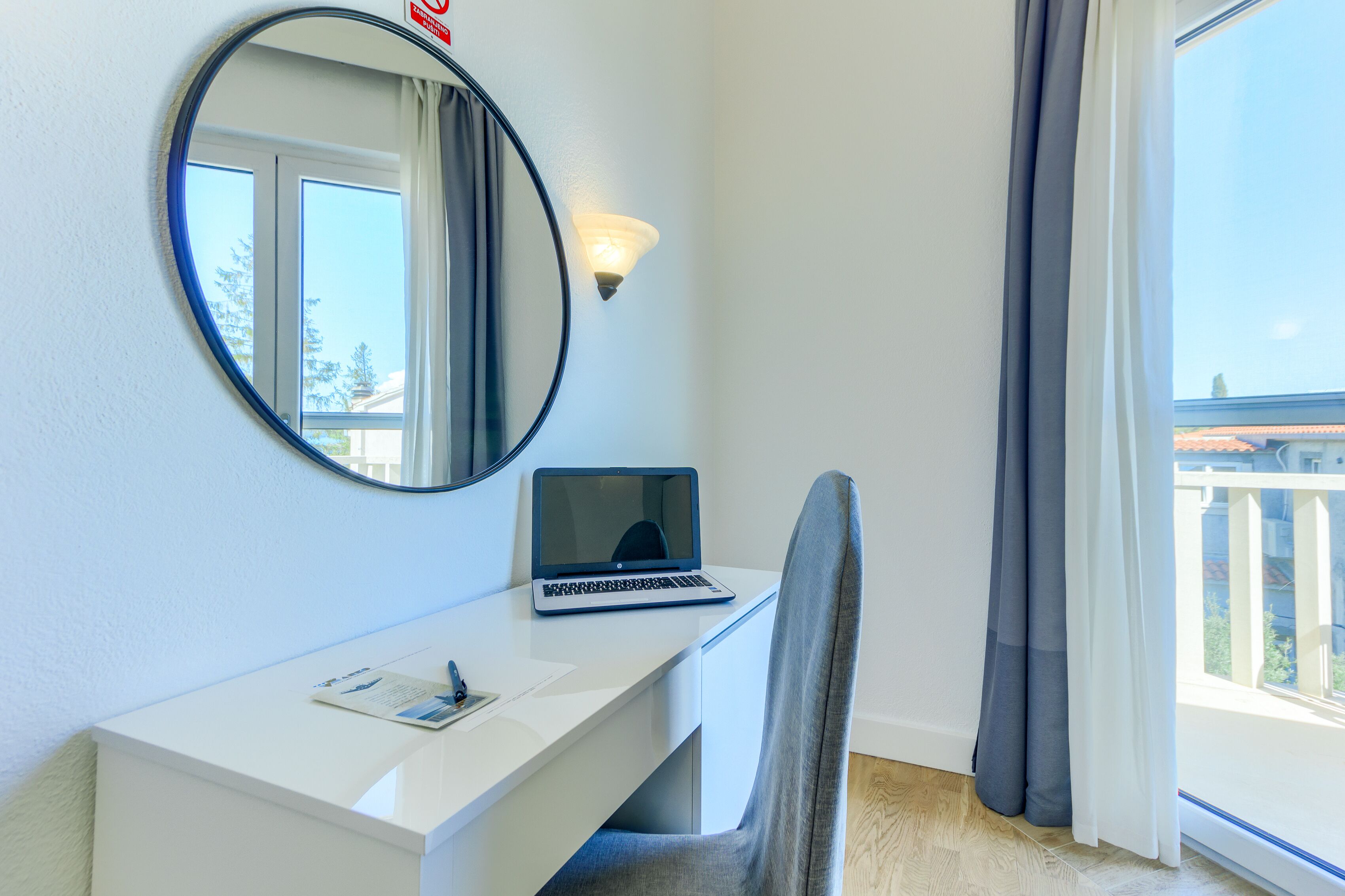 Standard Double Room | Minibar, in-room safe, desk, blackout drapes