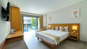 Deluxe Room with Pool View | In-room safe, desk, rollaway beds, free WiFi