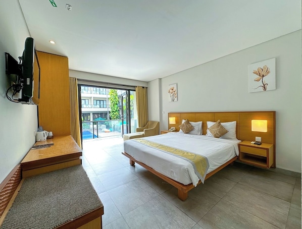 Deluxe Room with Pool View | In-room safe, desk, rollaway beds, free WiFi