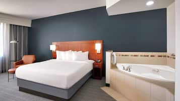 Suite, 1 Bedroom | Desk, laptop workspace, iron/ironing board, rollaway beds