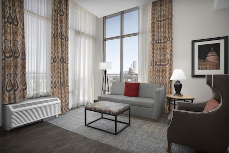 Suite, One King Bed, with Balcony | Living area | 32-inch TV with cable channels, pay movies