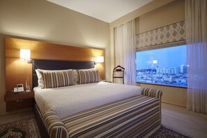 Ropa de cama de alta calidad y minibar 