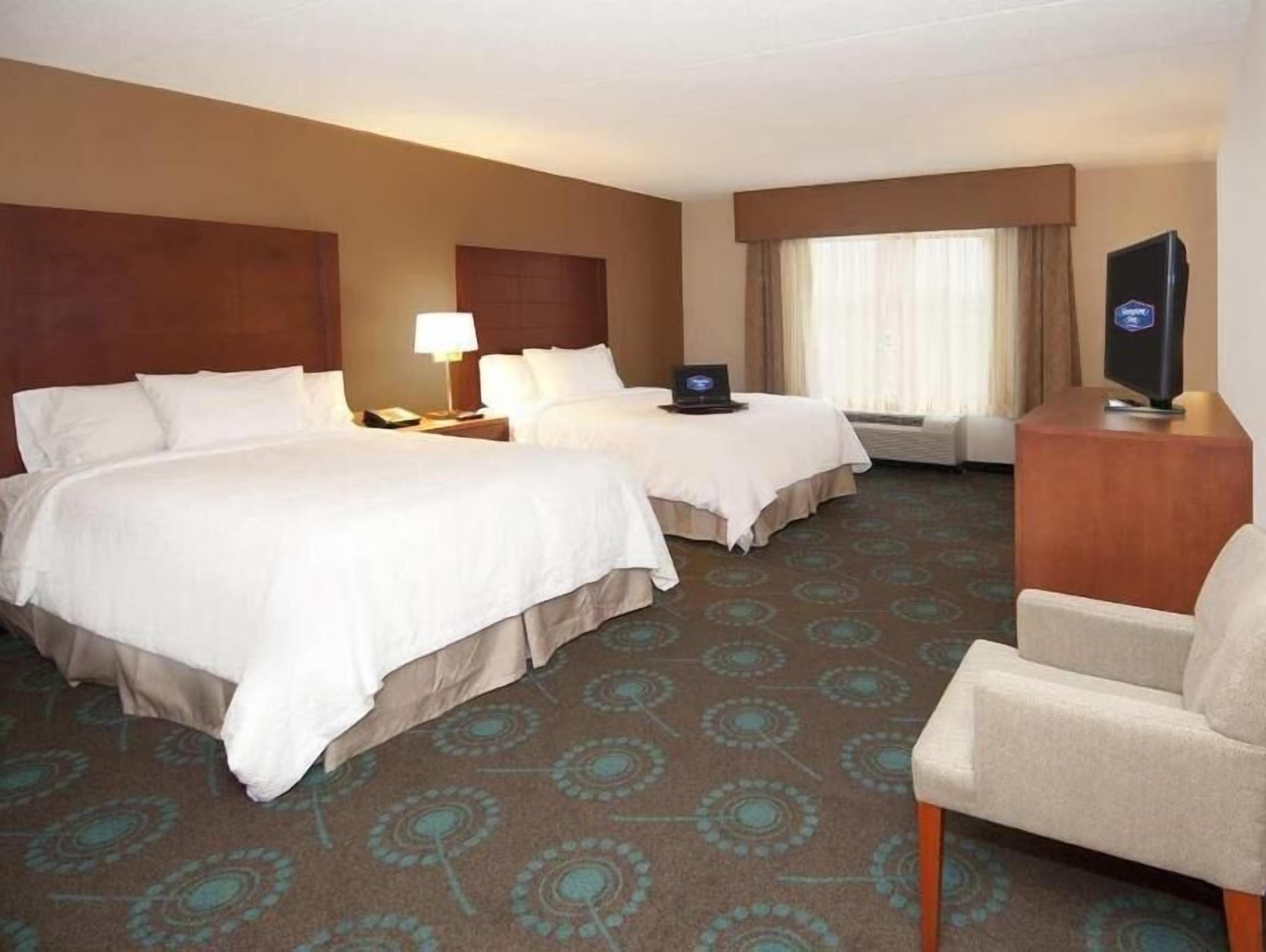 Down comforters, free WiFi, bed sheets, alarm clocks