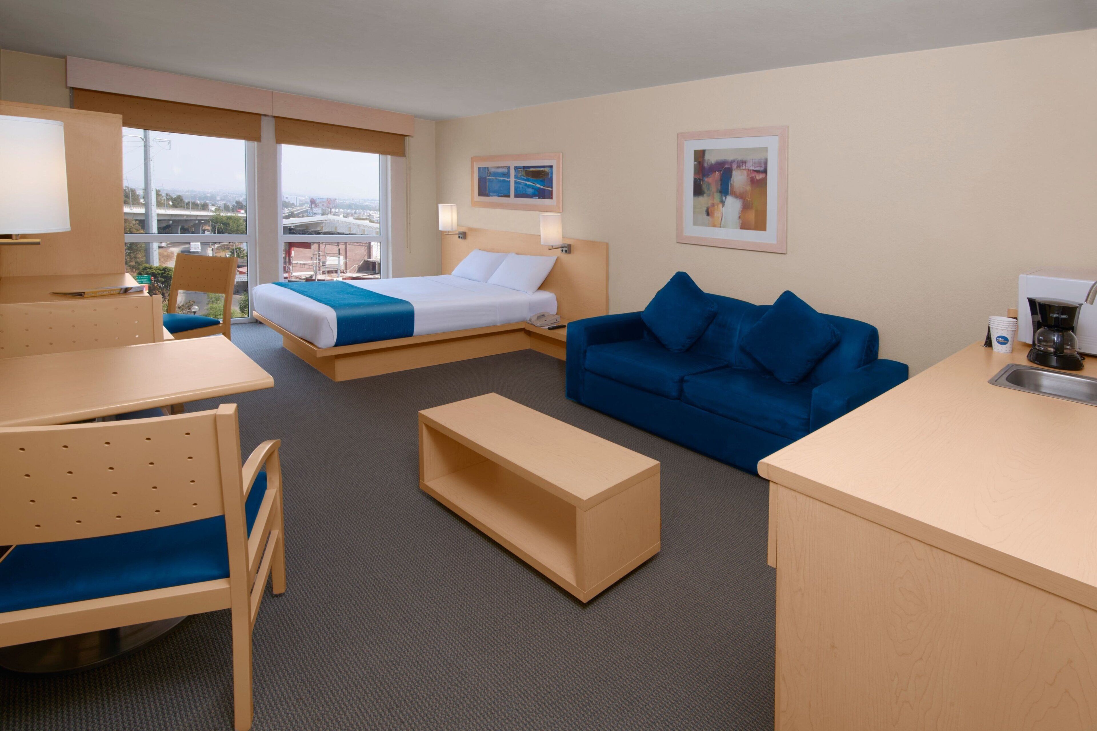 suite, 1 queen bed with sofa bed, non smoking | desk, iron/ironing board, free cots/infant beds, free wifi