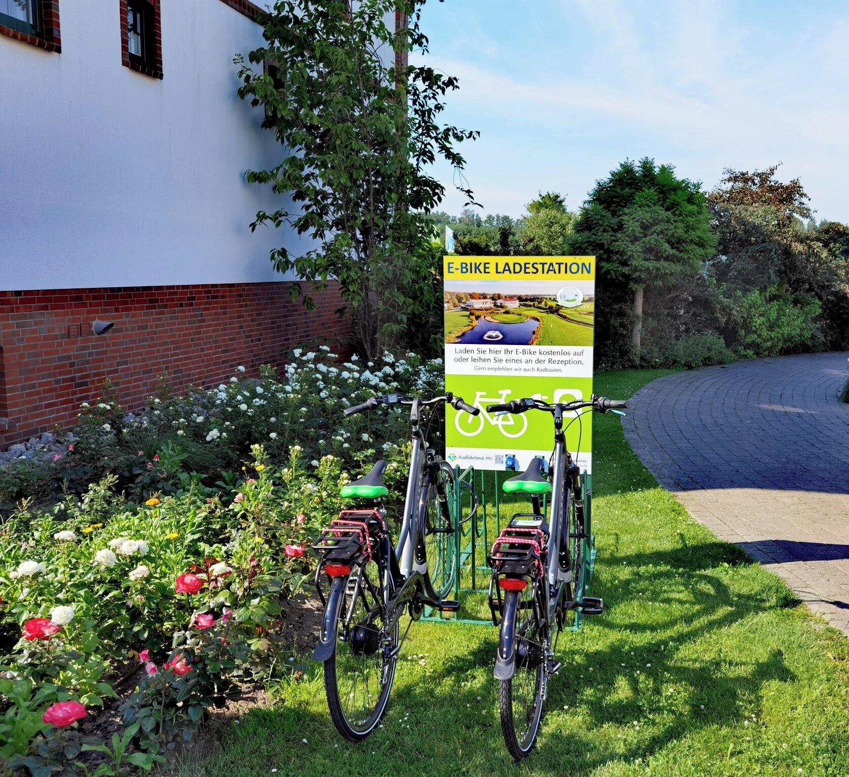 A bike parking station with a sign indicating it is an e-bike station.