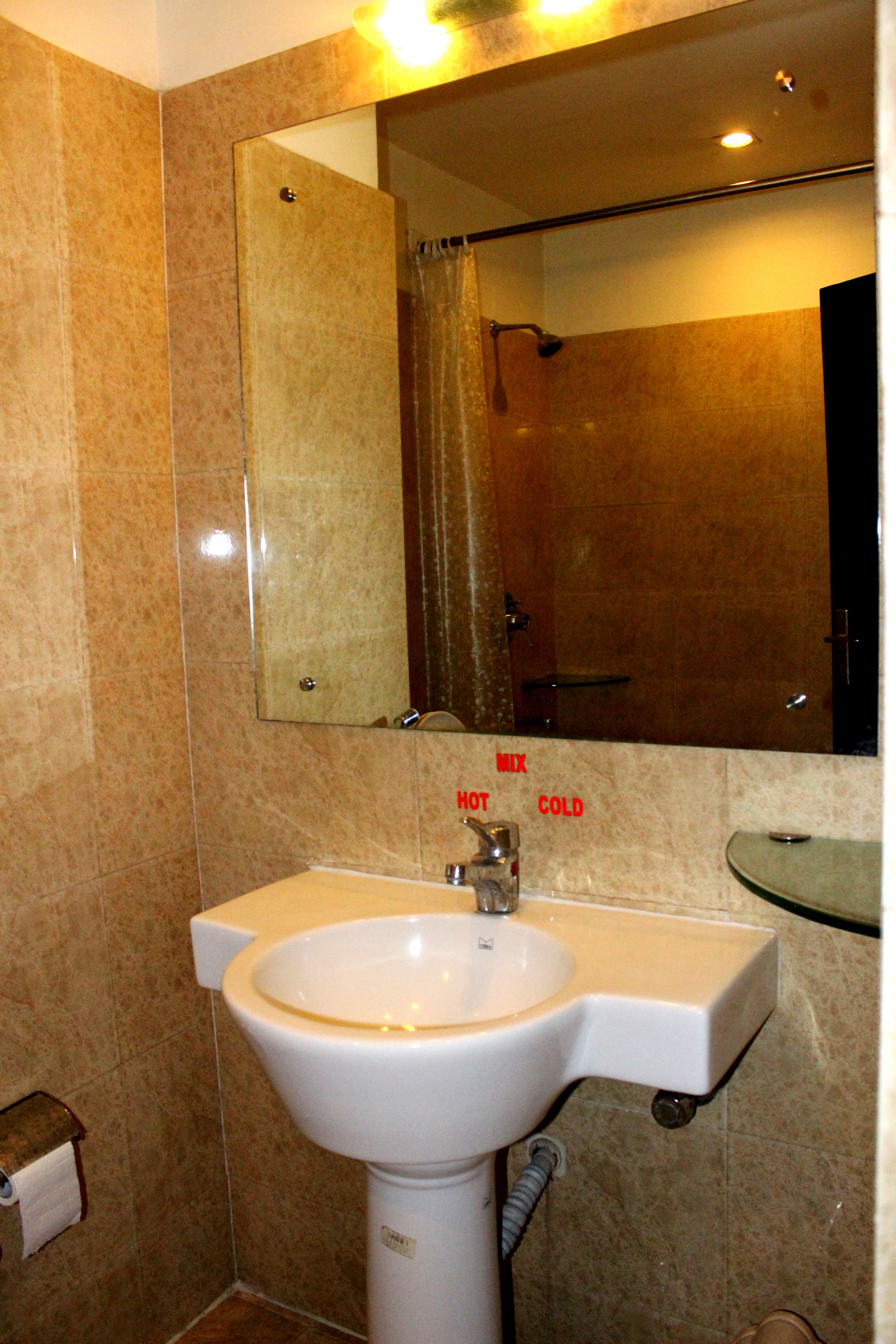 family room | bathroom | shower, rainfall showerhead, free toiletries, hair dryer