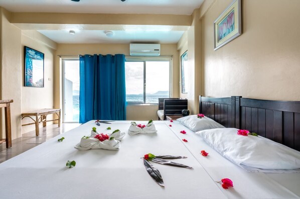 Chambre Deluxe, vue océan, en front de mer