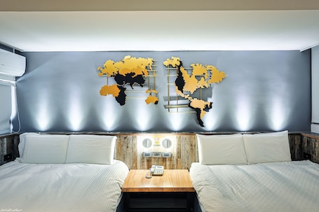 Deluxe Quadruple Room, 2 Double Beds | Down comforters, individually decorated, desk, laptop workspace