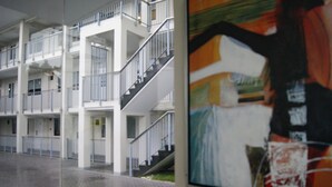 A multi-level building with balconies and a staircase. - Zpad Residences (Tacloban)