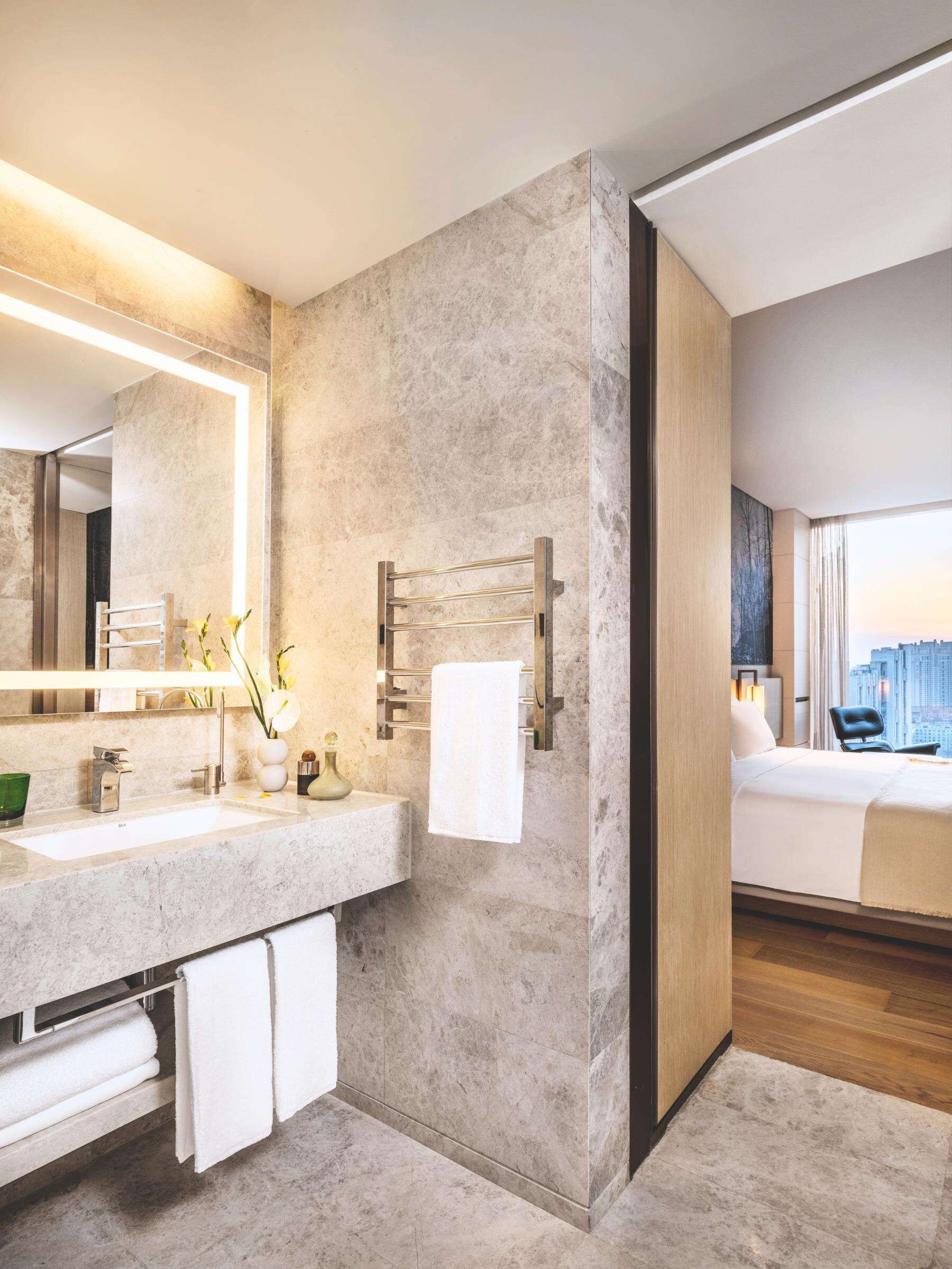 one-bedroom residence suite | bathroom | shower, rainfall showerhead, designer toiletries, hair dryer
