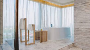 Shower, rainfall showerhead, designer toiletries, hair dryer