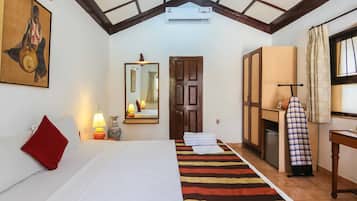 Minibar, desk, blackout curtains, iron/ironing board