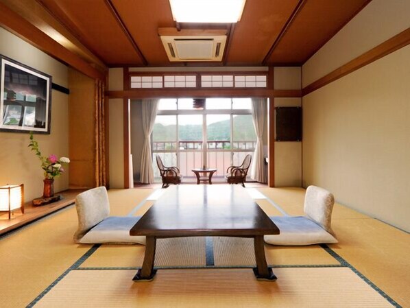 Traditional Room, Smoking, Private Bathroom (Japanese-Style) | Living area | Flat-screen TV