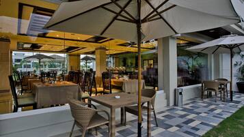 Breakfast, lunch, dinner served; international cuisine, pool views