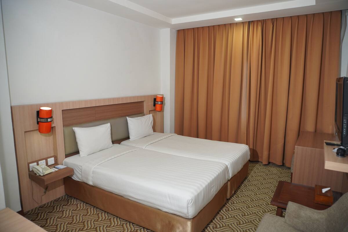 Habitación Business | Escritorio, wifi gratis, ropa de cama