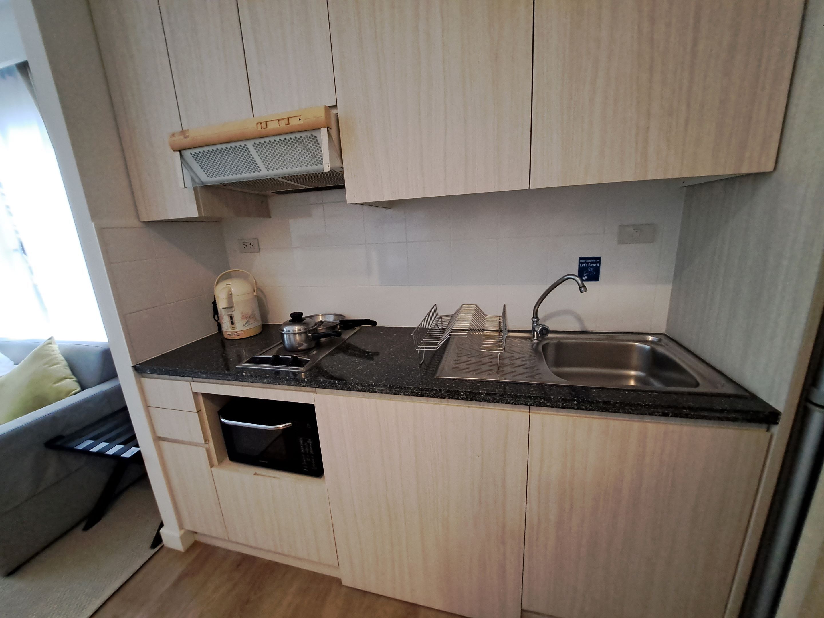 full-sized fridge, microwave, cookware/dishes/utensils